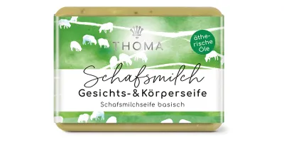 rechteckige, grünlich-gelbe Seife mit grüner Verpackung und Aufschrift Schafsmilch, Gesichts und Körperseife mit Hanföl von der Naturseifen Manufaktur Uckermark.