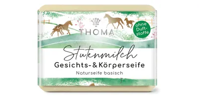 hellgelbe Seife mit grüner Verpackung und Aufschrift Stutenmilch, Gesichts und Körperseife von der Naturseifen Manufaktur Uckermark.